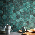 Emerald green hexagonal ceramic tiles with a matte textured finish form the wall in the nebula green hexagon collection
