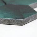 Hexagonal tile nebula green with a matte teal surface and textured speckled gray edges for stylish flooring and walls