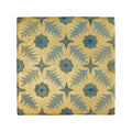 A square Neisha Crosland atlas pine flower nile coaster with gold leaf background and blue floral starburst patterns