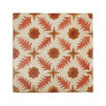 A square ceramic tile with a textured off-white surface featuring orange and rust floral starburst motifs from Neisha Crosland Atlas Pine Flower Paprika