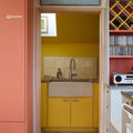 Yellow farmhouse sink neisha crosland atlas star anise buttercup with stainless steel faucet and beige tiled backsplash