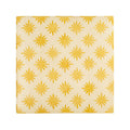 Cream-colored ceramic tile with golden-yellow starburst pattern from neisha crosland atlas star anise buttercup collection