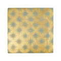 A neisha crosland atlas star anise sahara square decorative tile with a golden metallic surface and blue starburst pattern