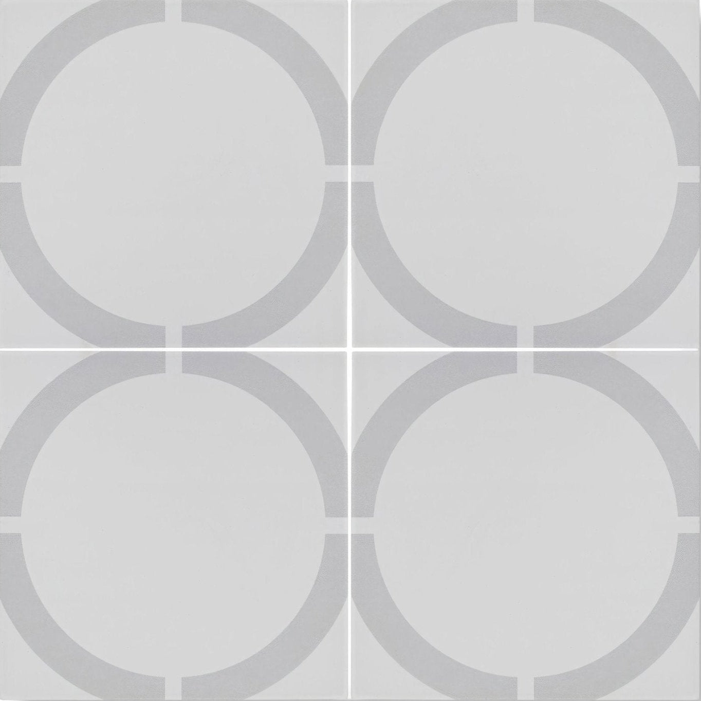 Gray circular patterned ceramic floor tile neisha crosland tulia hula hoop dove with dove gray tones