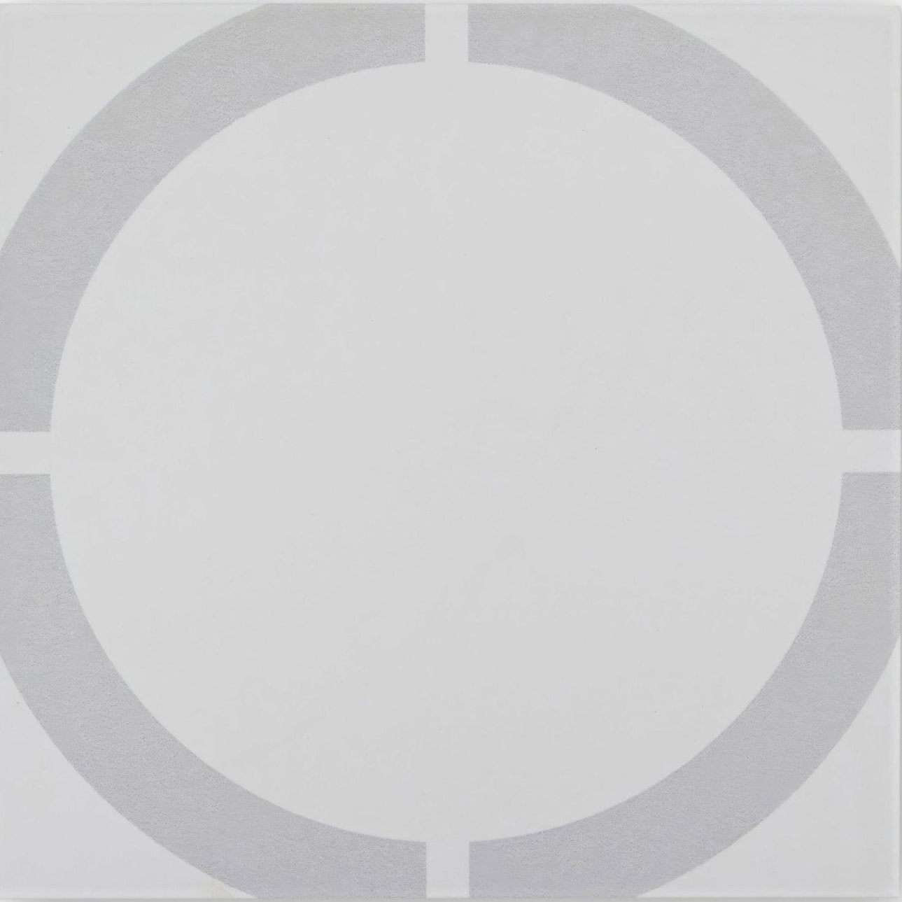 Gray circular tile with minimalist geometric design from neisha crosland tulia hula hoop dove collection
