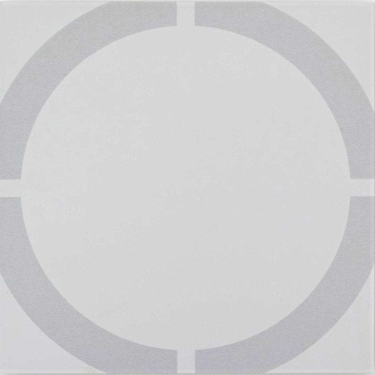 Gray circular tile with minimalist geometric design from neisha crosland tulia hula hoop dove collection