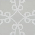 Gray ceramic tile neisha crosland tulia molly pebble with white symmetrical geometric interlocking loops and diamonds pattern