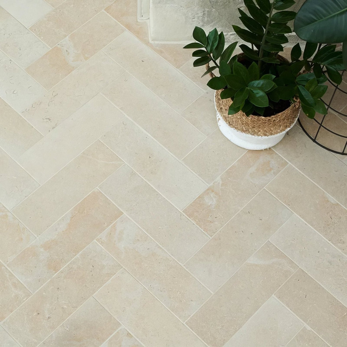 Beige herringbone patterned buscot limestone brick velvet finish stone floor tiles in natural stone material