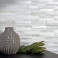 Neve Linear Stone Mosaic white marble linear mosaic with a grey ridged ceramic vase