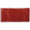 A glossy rectangular ceramic new burgundy half tile in rich terracotta red for stylish wall or floor use