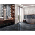 Nilo 1846 Blue Polished dark grey marble-effect tiles with a freestanding bathtub