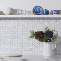 Nimbus Basketweave Stone Mosaic white and grey marble basketweave mosaic with a pitcher of hydrangeas