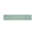 A sleek rectangular ceramic wall tile with a matte finish in soft mint green from Nina Campbell Rivage Aqua Glazed collection