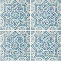 Blue and white patterned Nina Campbell Ronda porcelain tile with intricate floral and geometric designs