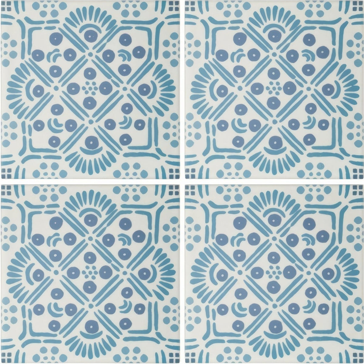 Blue and white patterned nina campbell seville blue porcelain tile with symmetrical decorative ceramic design