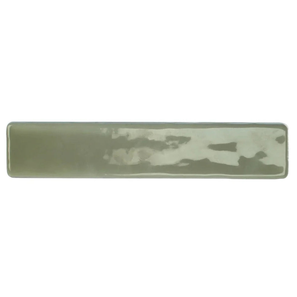 A rectangular ceramic wall tile by nina campbell with matte sage green glaze and subtle lighter patches