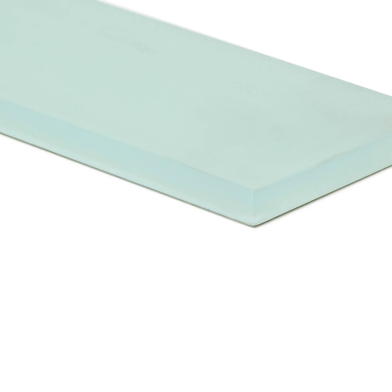 A rectangular translucent mint green glass tile with a smooth frosted surface and rounded edges from nordic glass fjord