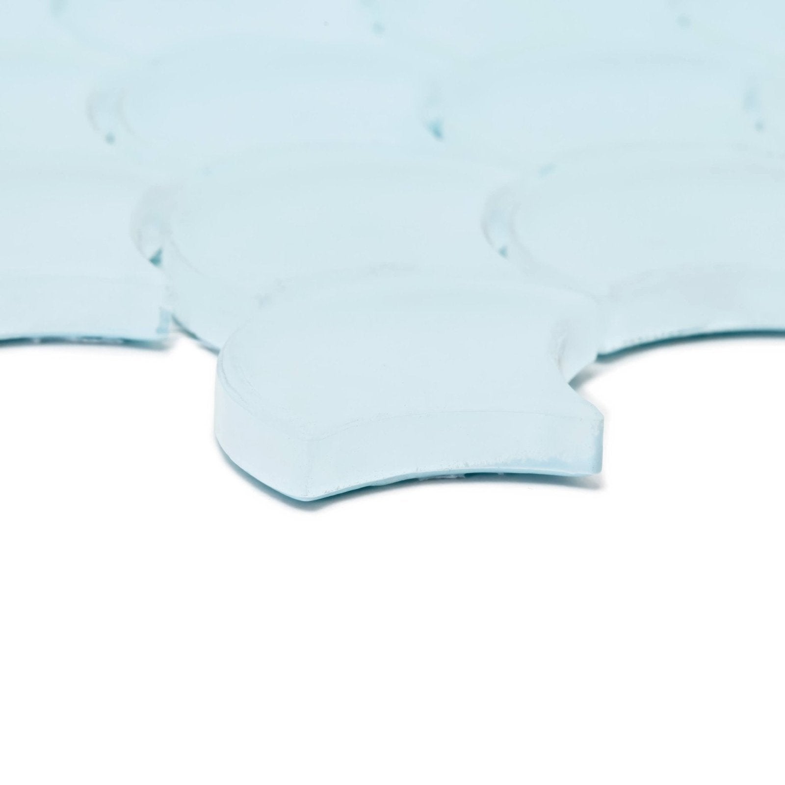 Light blue translucent glass mosaic tiles with smooth slightly curved edges nordic glass tromso geyser mosaic