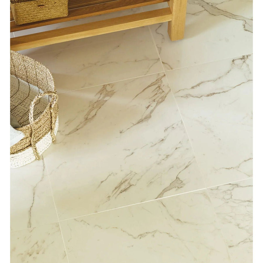 White marble-effect floor tiles with subtle gray veining north beach montgomery marble effect tile 60 x 30cm