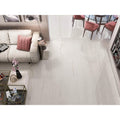 Shiny white marble-effect floor tiles with subtle gray veining from notre dame 1814 white polished collection