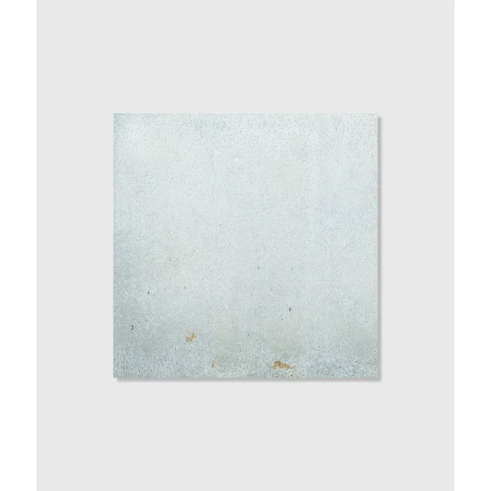 Nuance ceramic square textured canvas with soft frosted white surface and subtle speckled details