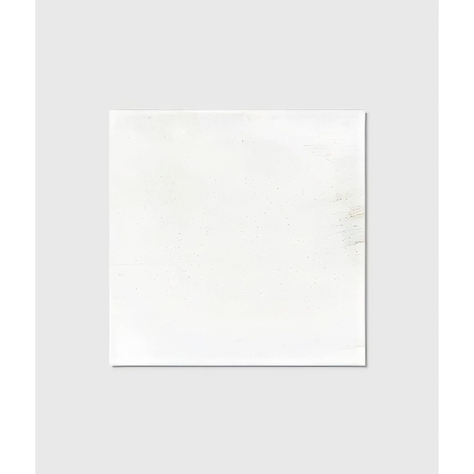 White square ceramic canvas with subtle speckled texture from nuance ceramic for artistic use