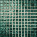 Emerald green oasis glass mosaic tile with shimmering textured surface in a square grid pattern