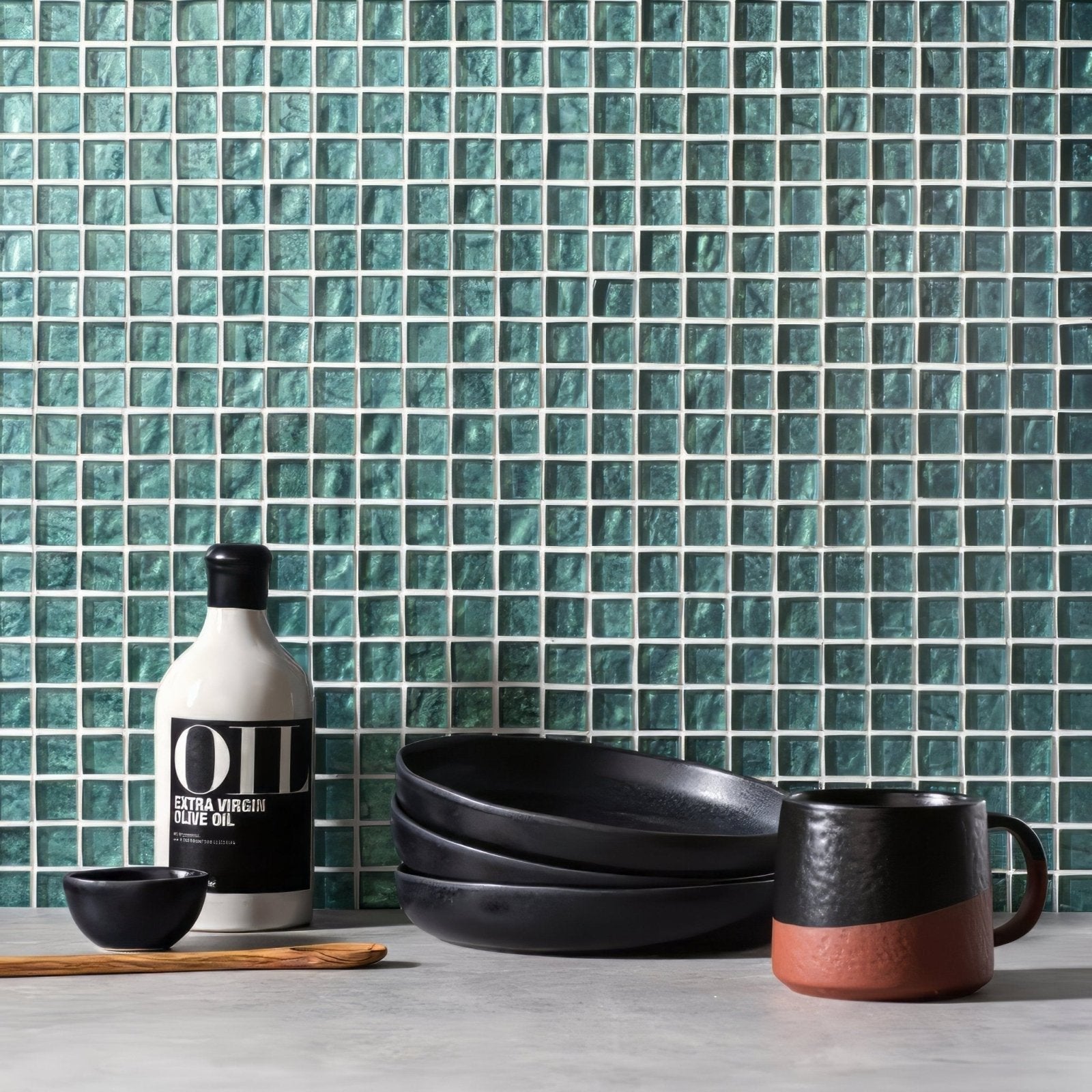 Oasis Glass Mosaic emerald green glass mosaic with a black ceramic mug