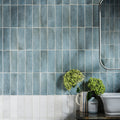 Oasis Veloute Ceramic Powder Blue Matt powder-blue ceramic wall tiles in a brick pattern