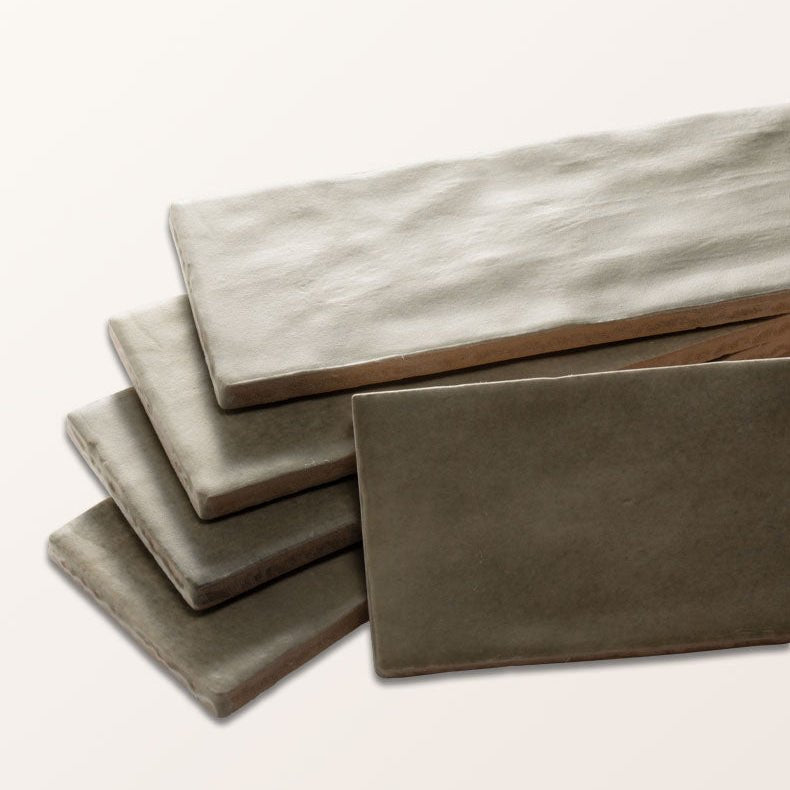 Stacked rectangular oasis veloute ceramic sage matt tiles with textured matte finish in varying gray shades