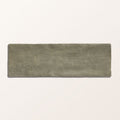 A rectangular olive green ceramic tile with a matte finish and subtle texture from oasis veloute sage matt collection