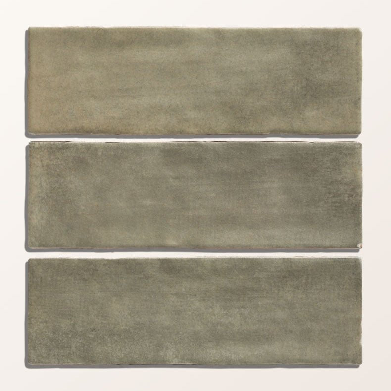 Three rectangular matte-finished ceramic tiles in sage gray with a subtle textured surface from oasis veloute matt collection