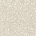 Beige terrazzo tile obi 1855 arena with a speckled pattern of white and light gray fragments