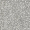 Gray terrazzo surface of obi 1855 ceniza with speckled white and light gray stone fragments in a smooth binder