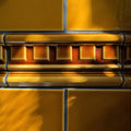 Golden ochre dentil moulding ceramic tile with glossy crackled glaze and raised rectangular detailing