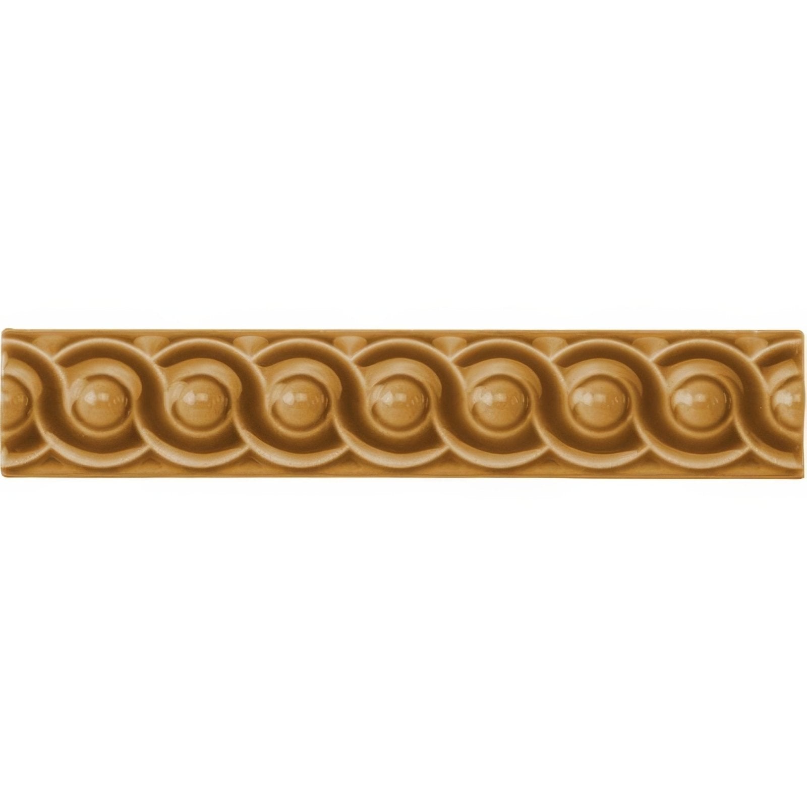 Tan ceramic tile ochre scroll moulding with a repeating pattern of raised rounded bead-like shapes