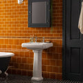 White pedestal sink with classic design and chrome faucets featured in ochre sigma moulding product image