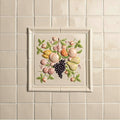 Off white field tile 105 x 105mm cream ceramic wall tile with raised relief design of assorted fruits and green leaves