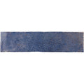 A rectangular oken brick blue ceramic tile with a textured crackled glaze finish
