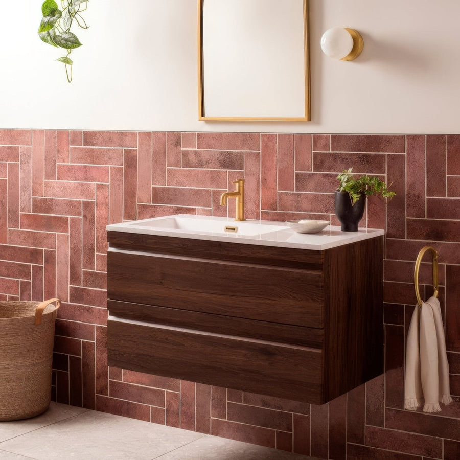 Dark wood floating bathroom vanity with white ceramic sink and gold faucet oken brick garnet design
