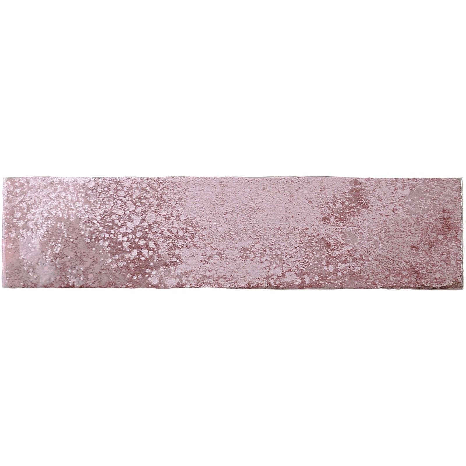 A rectangular dusty rose oken brick garnet tile with a textured surface and scattered metallic speckles