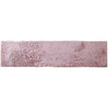 A rectangular dusty rose oken brick garnet tile with a textured surface and scattered metallic speckles