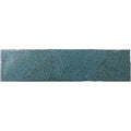 A rectangular teal ceramic tile with a textured speckled glaze finish called Oken Brick Green