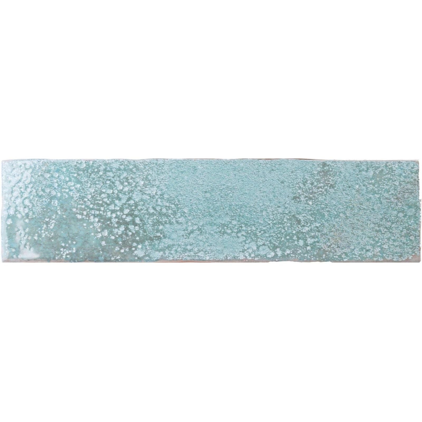 A rectangular ceramic tile with a textured speckled turquoise glaze finish from oken brick green collection