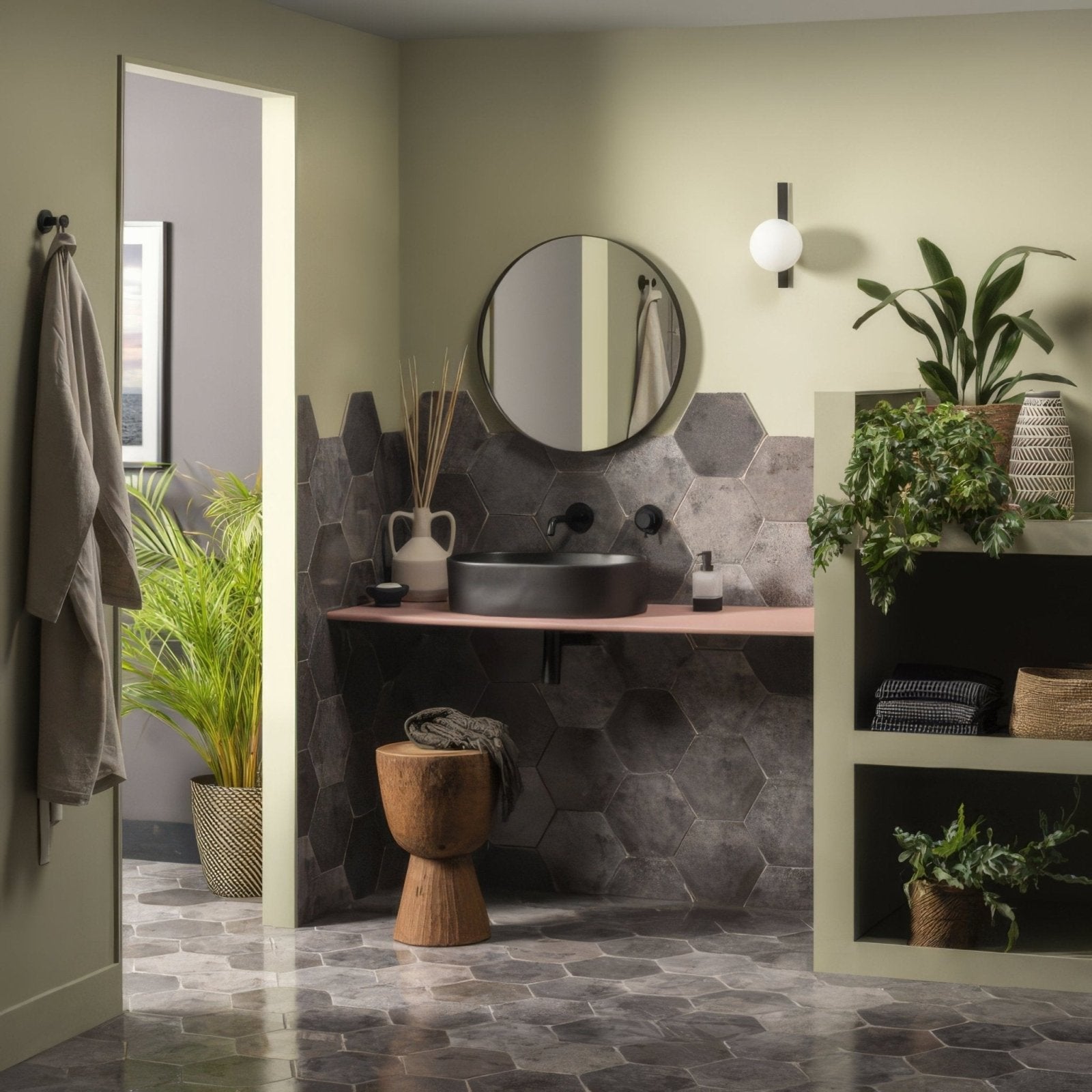 Oken Hexagon Anthracite black ceramic vessel sink with matte finish mounted on a pink countertop