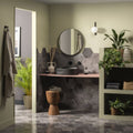 Oken Hexagon Anthracite black ceramic vessel sink with matte finish mounted on a pink countertop