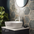 White ceramic vessel sink with sleek modern design featured in the Oken Hexagon Green collection