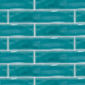 Vibrant teal glossy subway wall tiles with crisp white grout from onda aquamarine collection