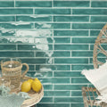 Teal glossy ond a aquamarine subway wall tiles with subtle white grout lines for stylish wall installations