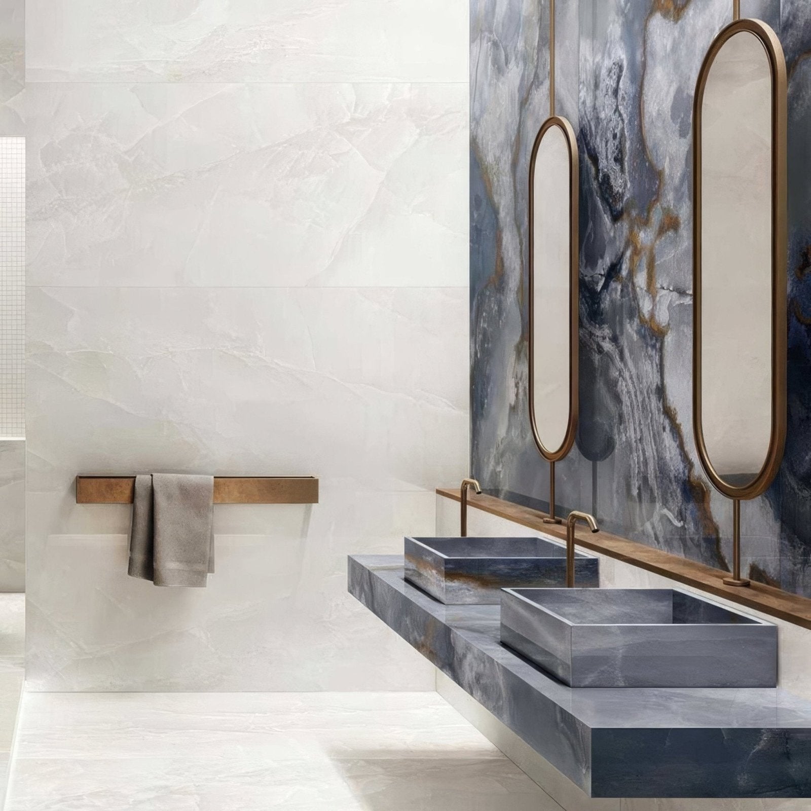 Onyx Blue in Polished and Matt Tiles blue marble-effect tiles with rectangular sinks on a countertop